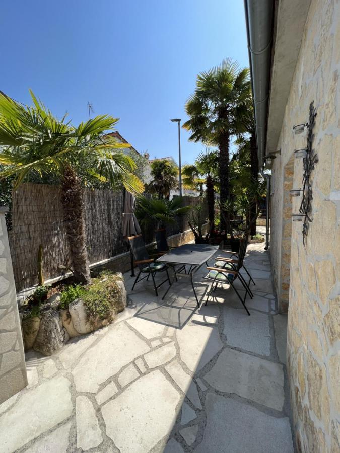 Apartmani Palme Funtana Esterno foto